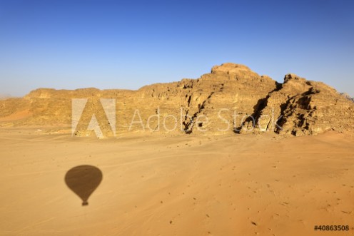 Picture of Shadow of hot-air balloon over the desert of Wadi Rum